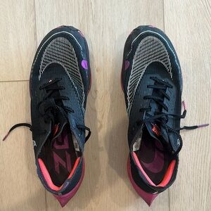 Nike Black and Pink Athletic Shoes with Cushioned Sole
